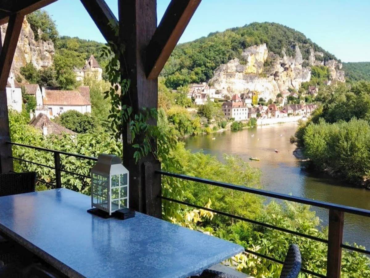 La Terrasse — Over the village rooftops, down to the Dordogne and the cliffs
