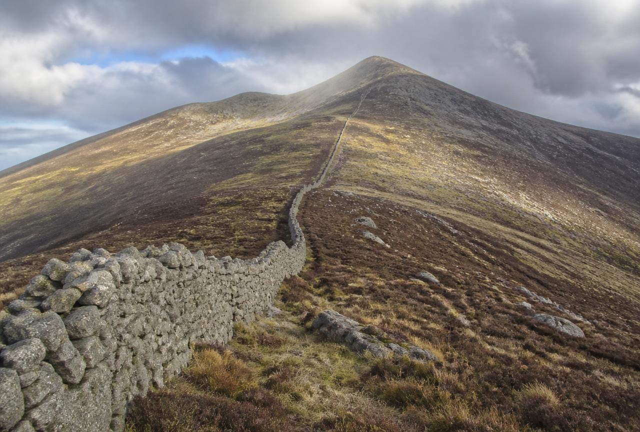 The Mourne Wall climbing granite slopes in the Mourne Mountains