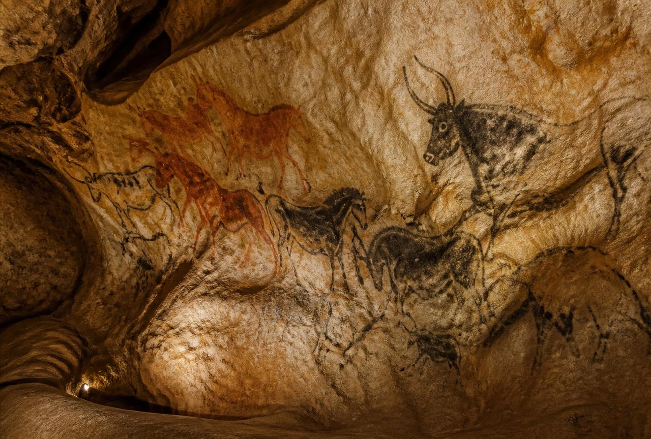 Palaeolithic paintings of bulls and horses on a cave wall in the Vézère valley