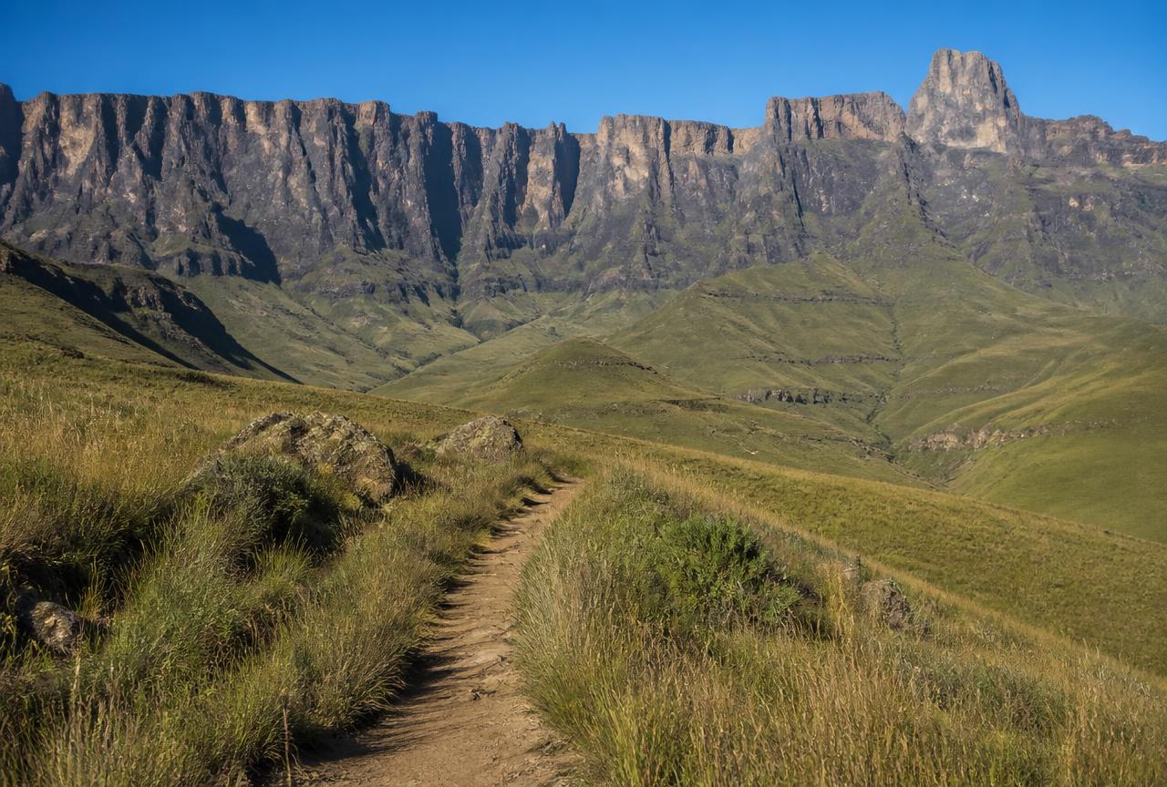 A footpath below the basalt cliffs of the Drakensberg escarpment