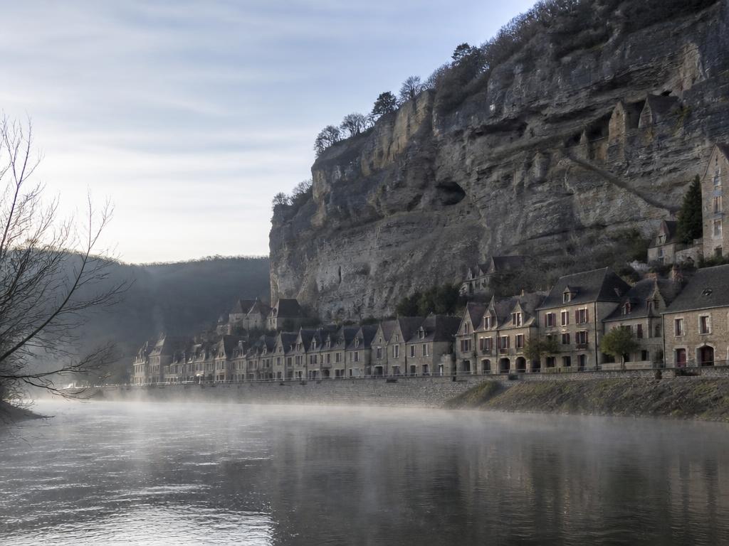 La Roque-Gageac in winter, mist rising off the Dordogne